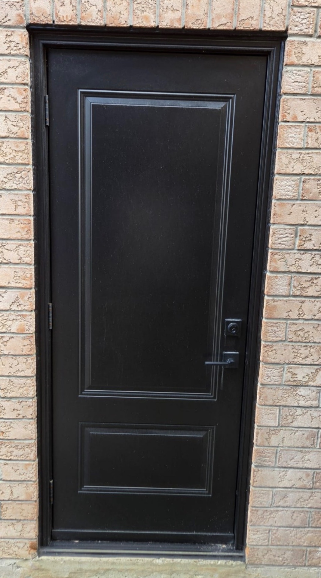 Matte black two-panel steel side door